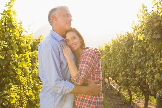 Smiling woman embracing her man - Powered by Adobe