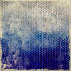 Grunge blue background with perforated metal plate