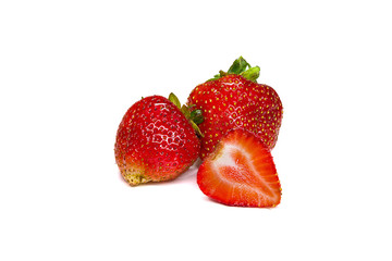 Three strawberries on a white background closeup