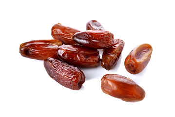 stack of date palm fruit on white background