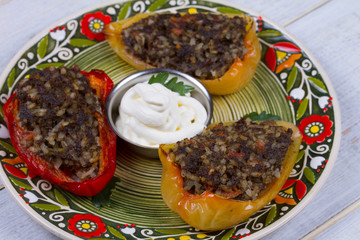 Baked Stuffed Peppers with Meat, Wild Rice, Vegetables and Greens