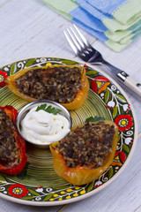 Baked Stuffed Peppers with Meat, Wild Rice, Vegetables and Greens