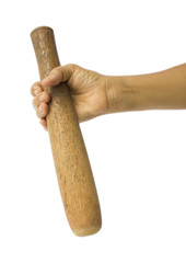 Old wooden pestle on old woman's right hand isolated on white background