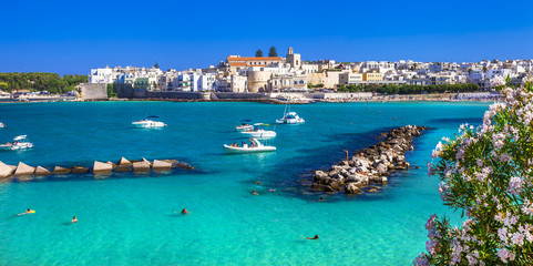 Italian holidays - beautiful Otranto with azure sea, in Puglia - obrazy, fototapety, plakaty