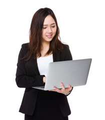 Young businesswoman use of the notebook computer