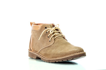 Brown man's fashion shoes isolated on white background