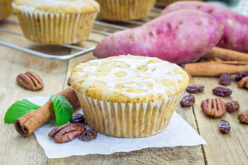 Citrus-glazed sweet potato muffins with pecan nuts and raisins