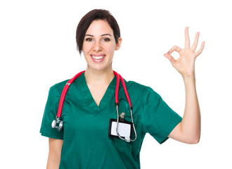 Young doctor with ok sign gesture