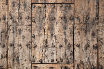 Old wooden gate fragment, background texture