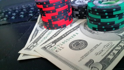 Poker chips and dollars