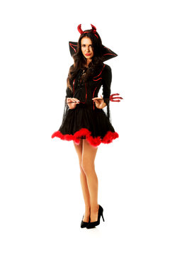 Woman wearing devil clothes, holding trident