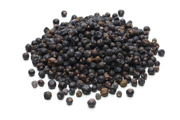 dried juniper berries on white background