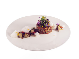 fried quinoa with artichoke and apricot kernel stew