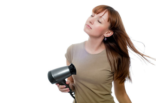 Redhead Woman Using Hairdryer