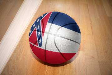 Obraz premium basketball ball with the flag of mississippi state