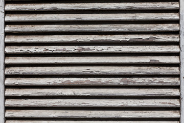 wooden shutters, covering a window or door
