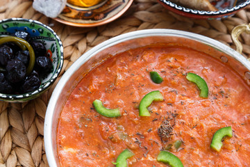 Menemen in frying pan on the table close-up view from above