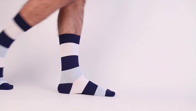 Men walking with colorful socks