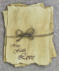 Antique love letters with Hope,Faith, Love tied with rope