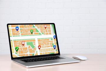 Modern laptop with map gps navigation application