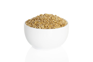 Pearl barley seeds in a cup