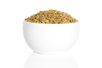 Pearl barley seeds in a cup