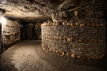 Deurstickers Catacombs of Paris - Skulls and Bones in the Realm of the Dead -4 © dirk94025
