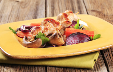 Chicken skewer and vegetables