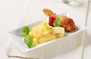 Roasted chicken drumstick and mashed potato