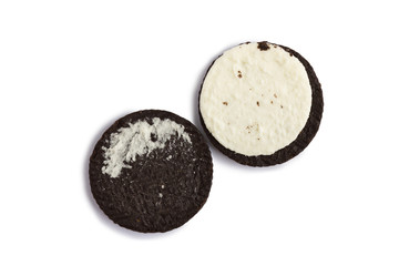 Chocolate cookies with cream on white background