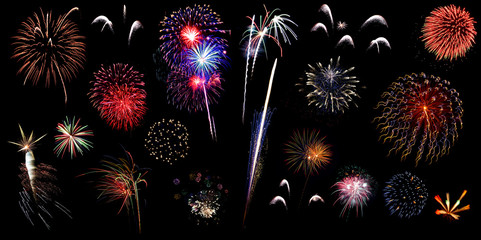 Colorful holiday fireworks on the black sky background