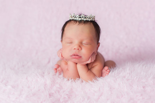 Newborn Baby Girl Wearing a Dainty Rhinestone Crown