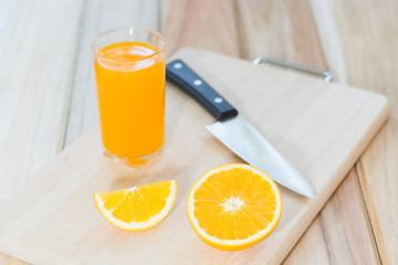 Slices of orange, citrus on a chopping board