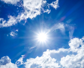 Naklejka na ściany i meble Blurred image of blue-sky with sun for background use