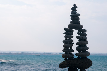 Fototapeta premium Stone pile in a beach