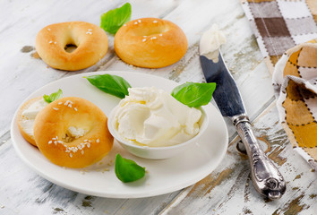 Fresh bagels with cream cheese for breakfast.