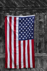 American flag on the rustic wood wall