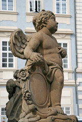 Fototapeta premium Statue on the Holy Trinity Column (Plague Column) at Lesser Town Square. Prague, Czech Republic