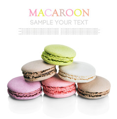 Colorful macaroon cake in a row isolated