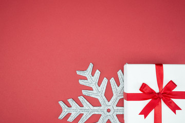 Fototapeta na wymiar luxury color gift box for holiday event silk wrap snowflake