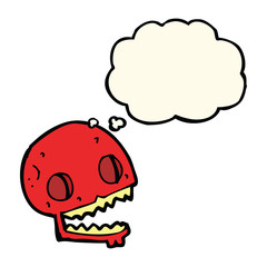 cartoon spooky skull with thought bubble