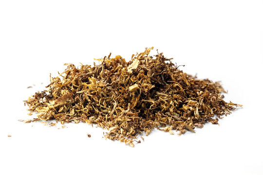 small heap of loose tobacco,  isolated on a white background