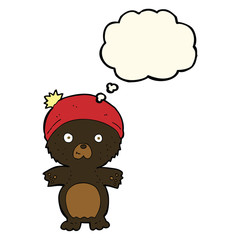 cartoon cute black bear in hat with thought bubble