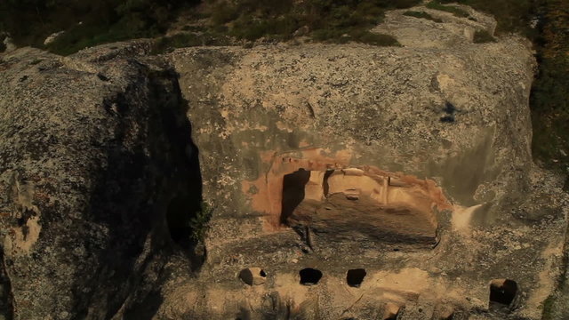 Aerial View: Eski-Kermen cave city, Bakhchisaray, Crimea. Autumn 2013. Eski Kermen is the medieval city-stronghold in the Crimea. Eski Kermen was founded in the VI century as a Byzantine stronghold.