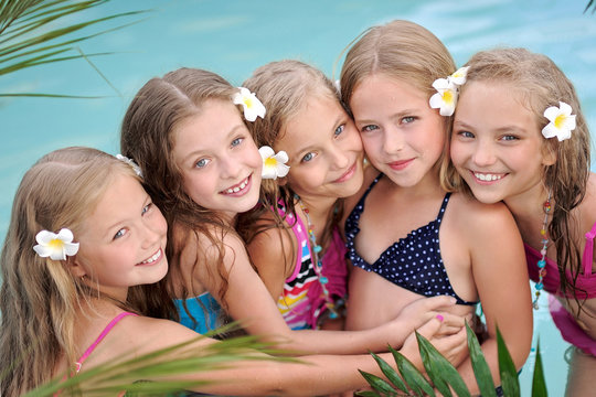 Portrait of children on the pool in summer