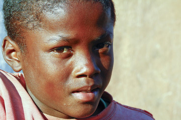 African boy - Confidence that can only grow out of a strong hear