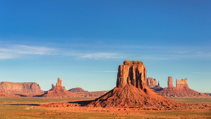 Monument Valley under blue sky, desert canyon in USA, Arizona