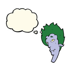 cartoon vampire head with thought bubble