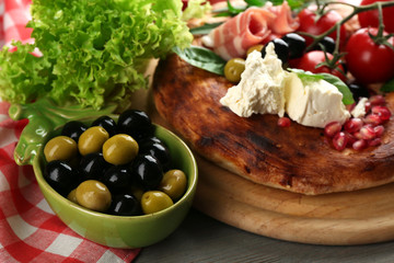 Ingredients of Mediterranean cuisine, on wooden board, close-up