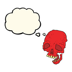 cartoon spooky skull with thought bubble